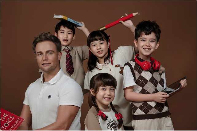 Our story did not begin in a classroom, but on a stage.